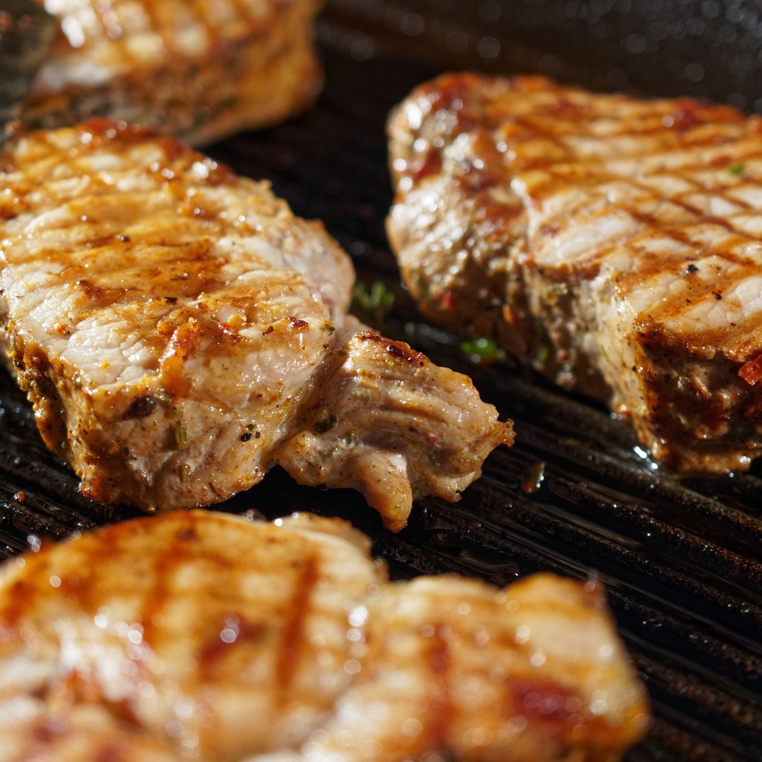 Grilled Pork Collar with Rosemary and Garlic Recipe on a plate with sides