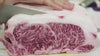 Skilled butcher portioning a Wagyu beef steak at MeatKingHK